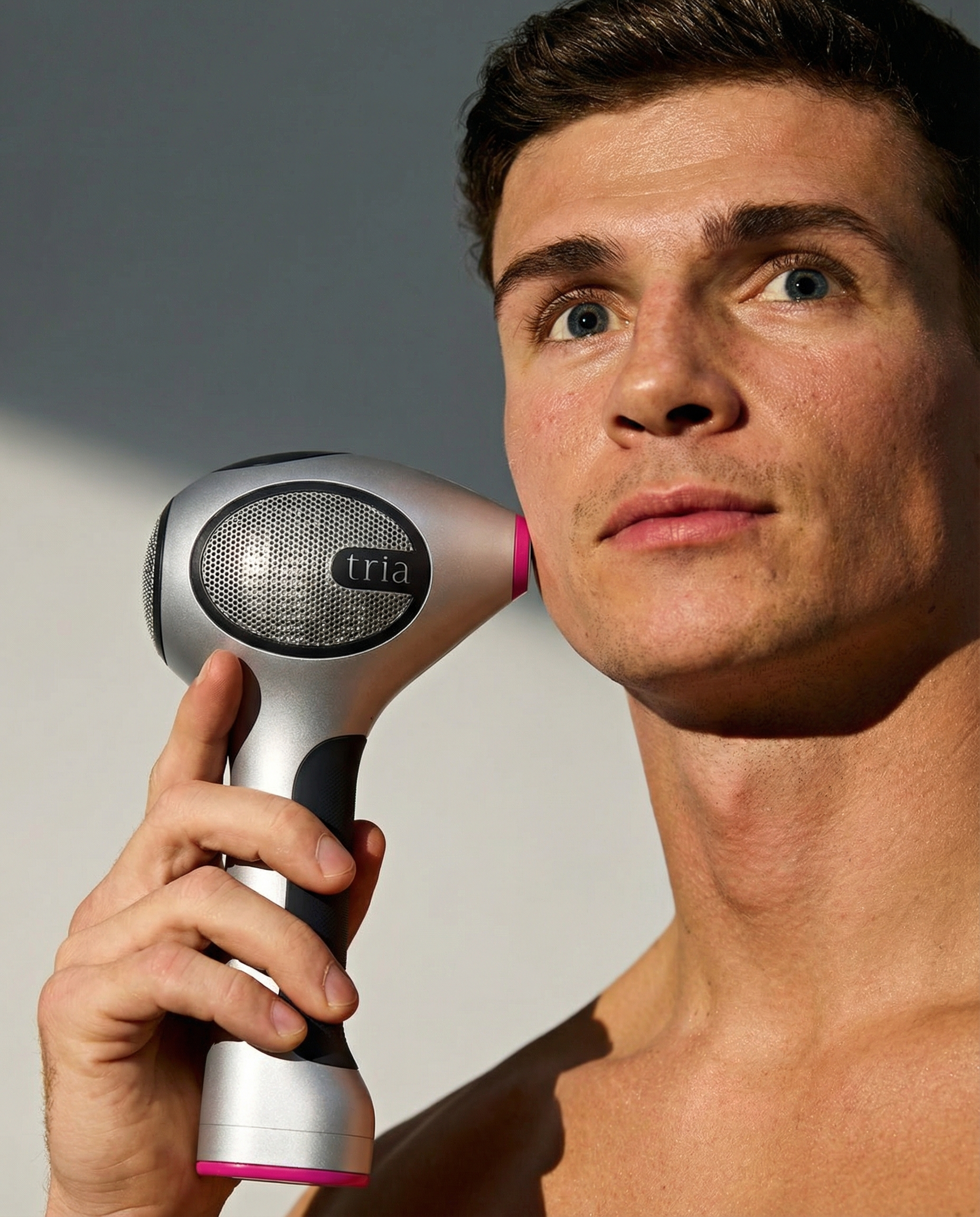 Man using Tria 4X Hair Removal Laser on face